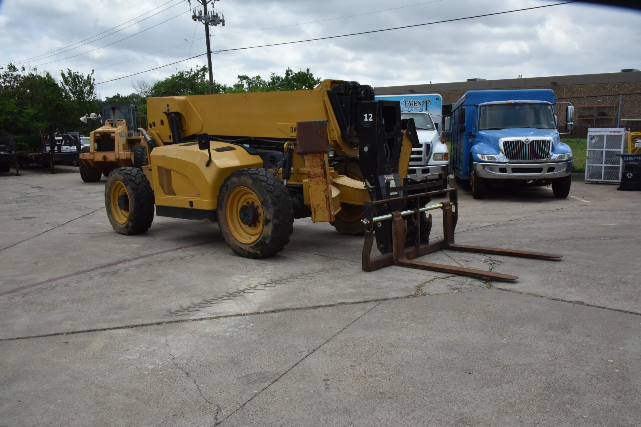 Unleashing Power and Efficiency: The 2013 Caterpillar TL1255C Telehandler for Superior Material Handling