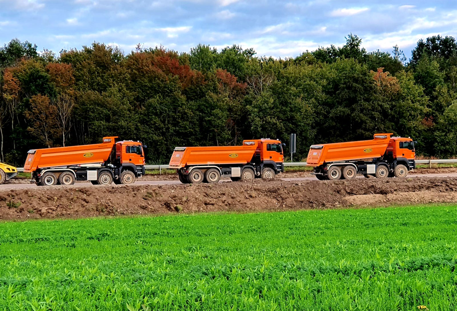 Hauling the Load: Dump Trucks and Their Vital Role in Construction